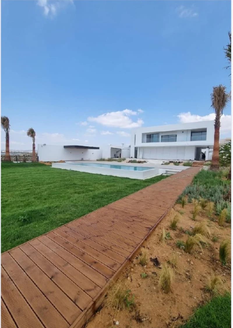 Outdoor works with a terrace and swimming pool