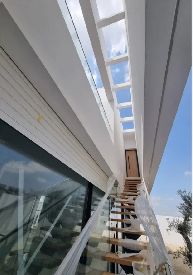 Modern façade with an outdoor walkway