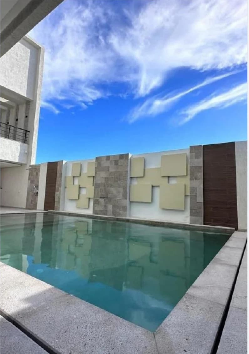 Outdoor works with a swimming pool completed by S2MBOU