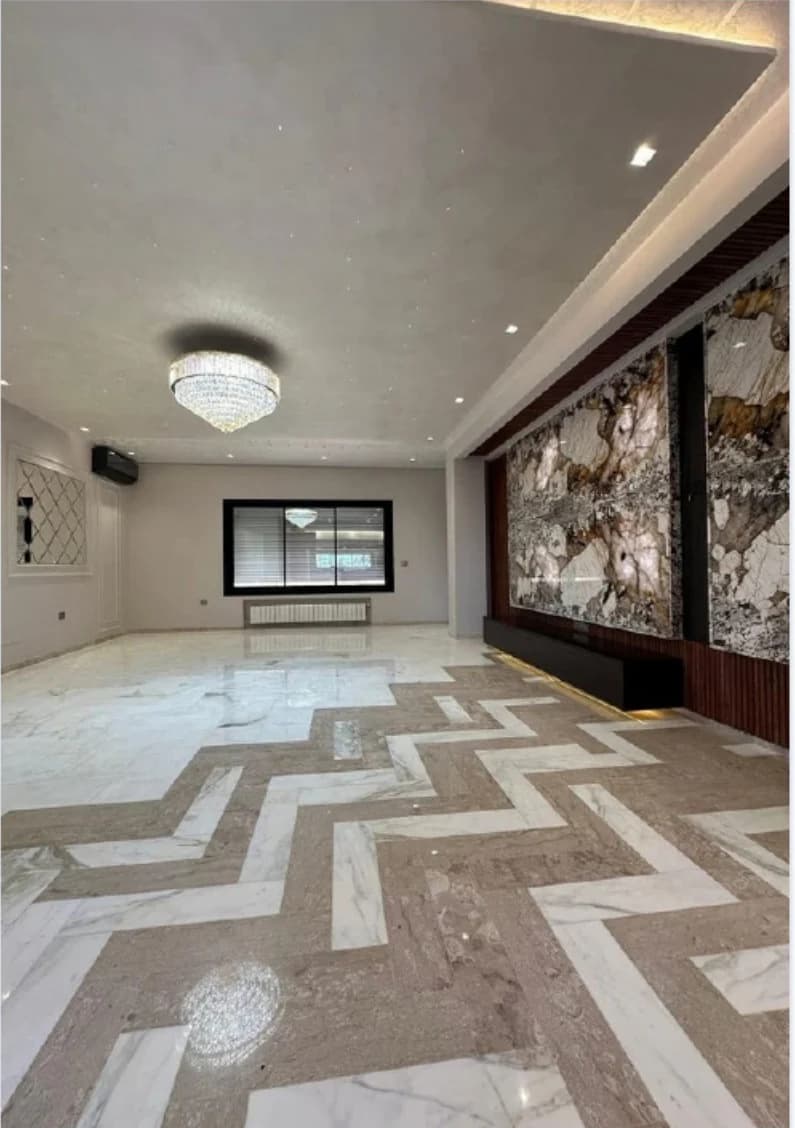 Fitted room with a geometric floor and decorative wall